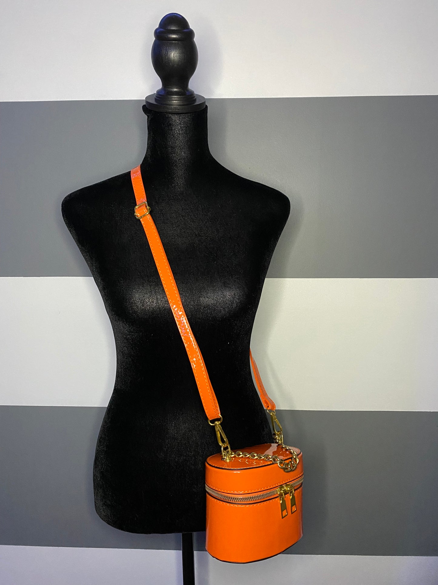 Oh Bhucket glossy PU leather handbag in silver with detachable crossbody strap